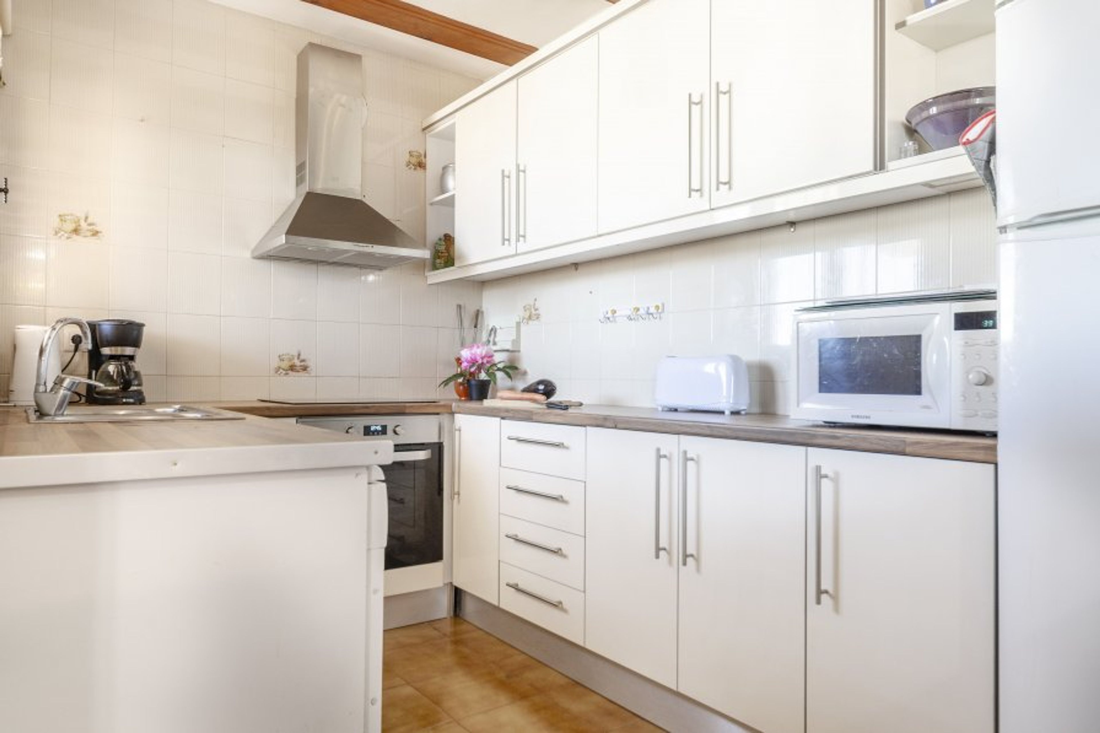 Fully renovated kitchen, complete with modern features.