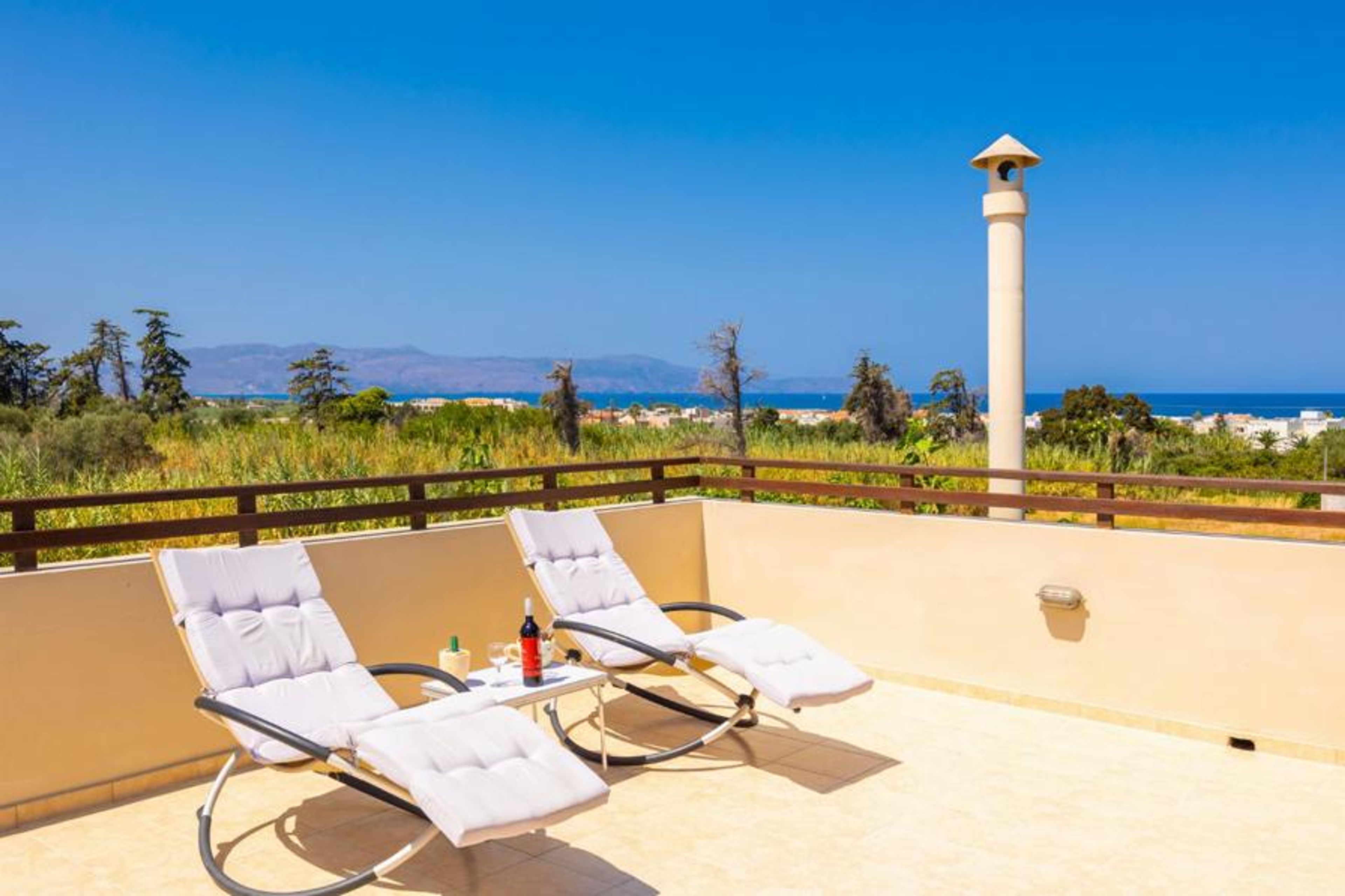 Upper terrace area with sea views