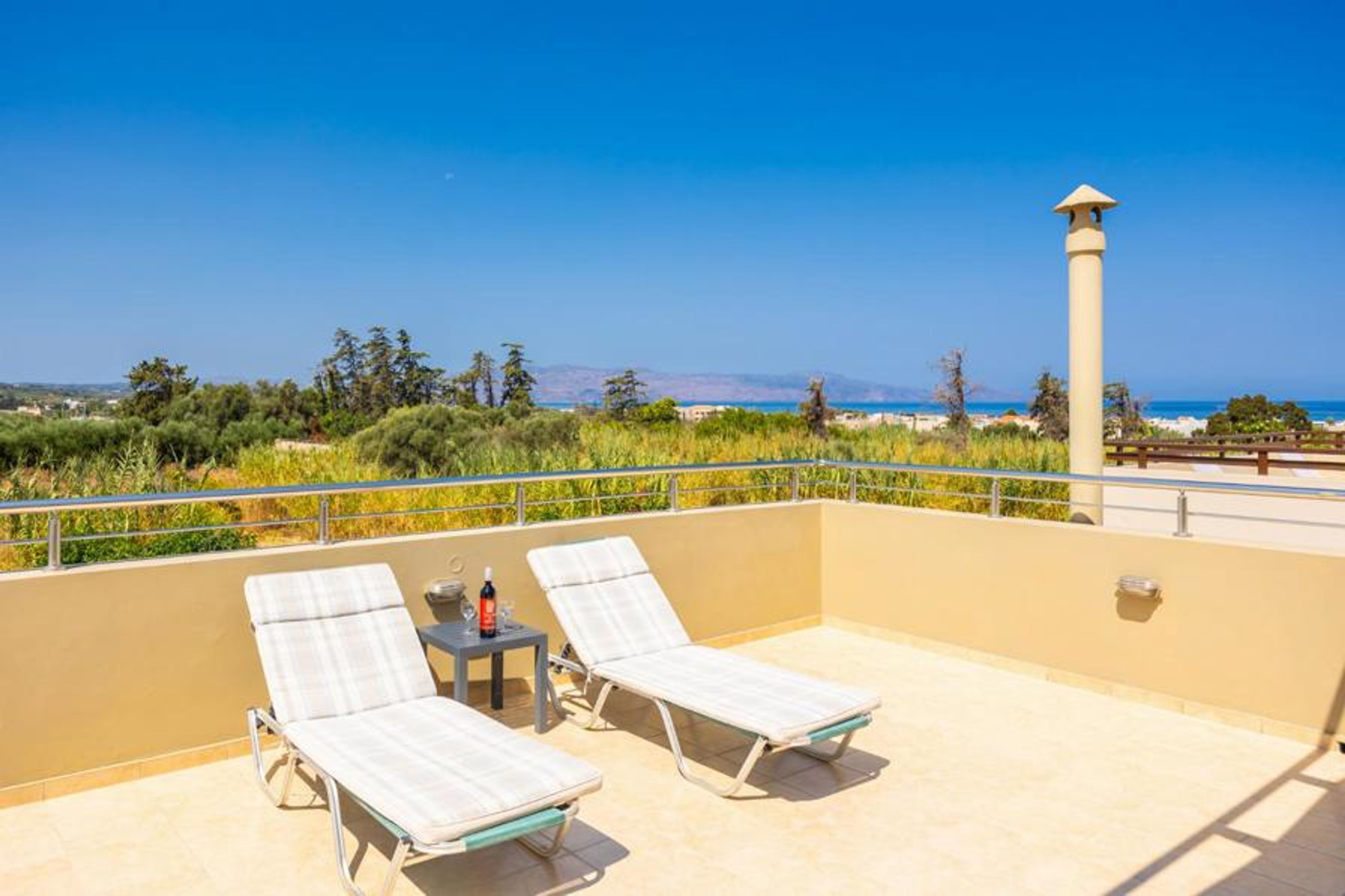 Upper terrace area with sea views