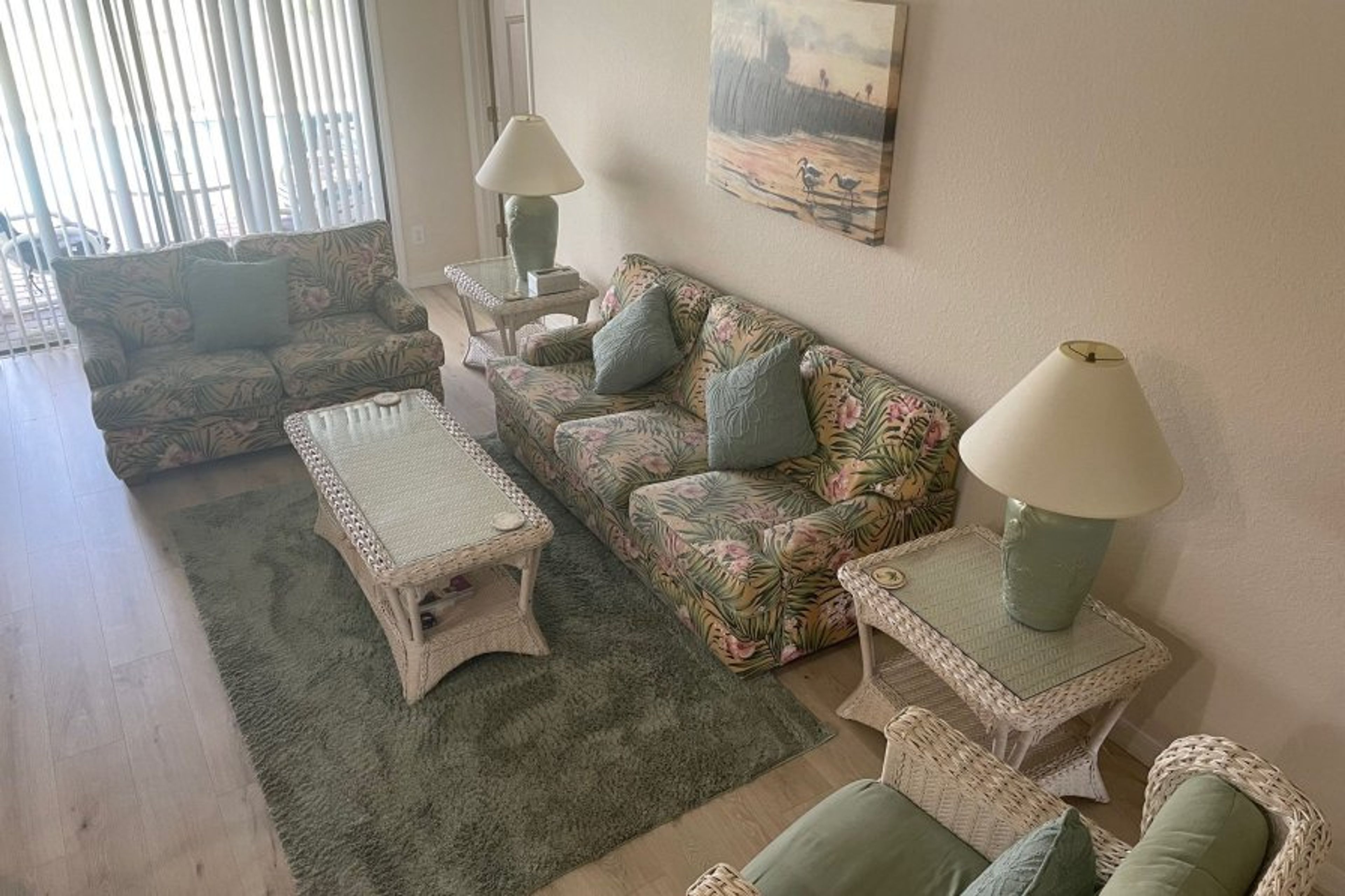 Living room with patio doors to pool 