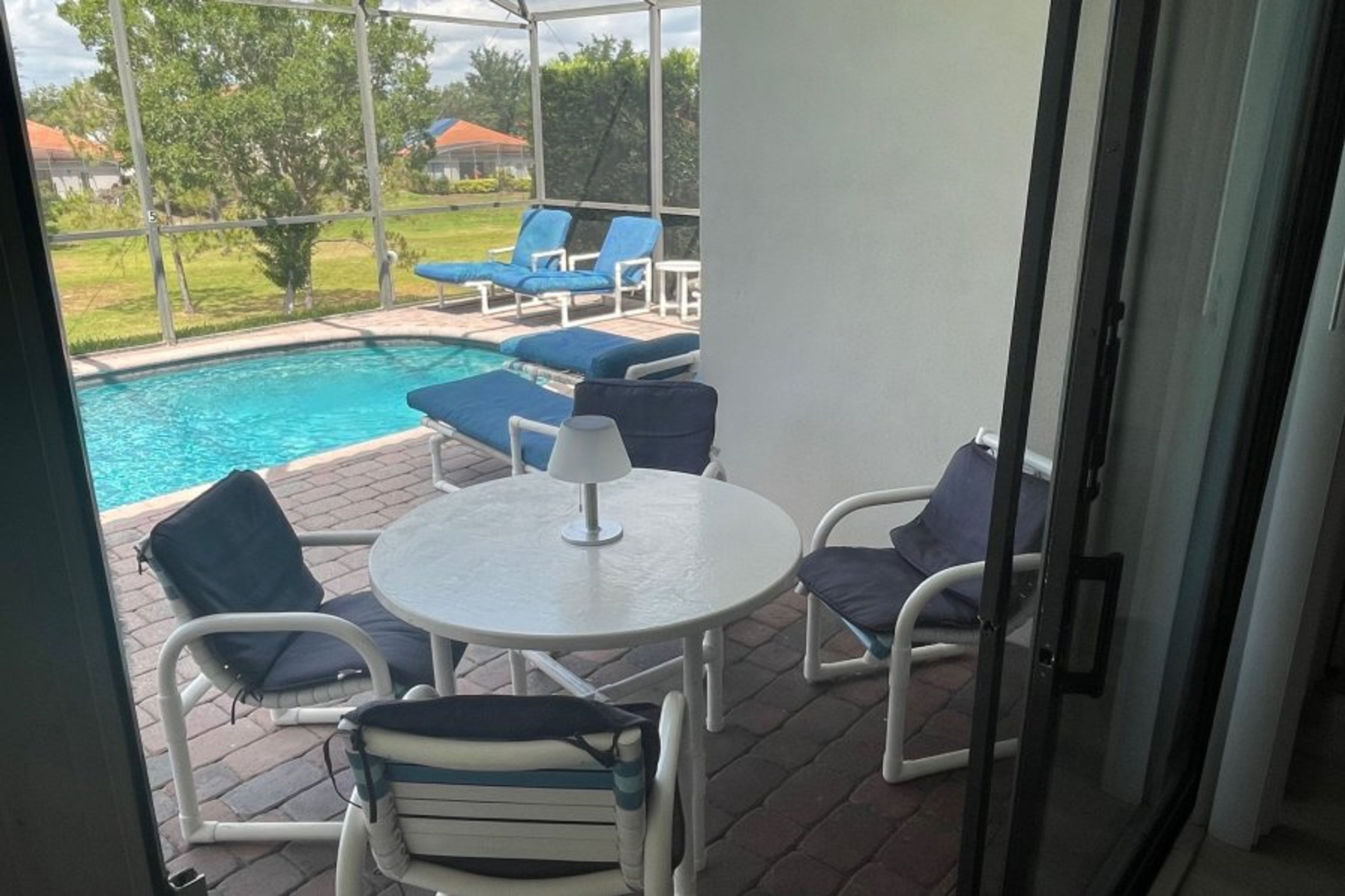 Deck and pool area with lovely view and comfy loungers 