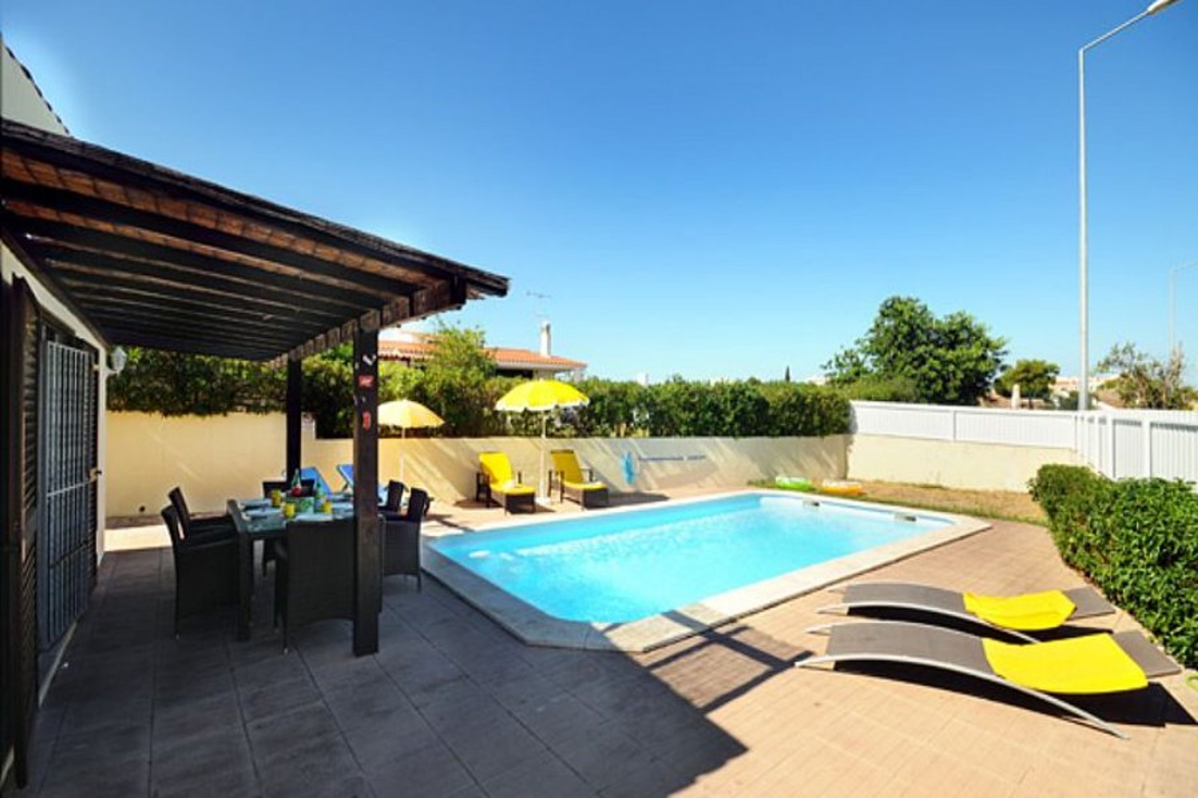 outside dining area, with plenty of sunloungers