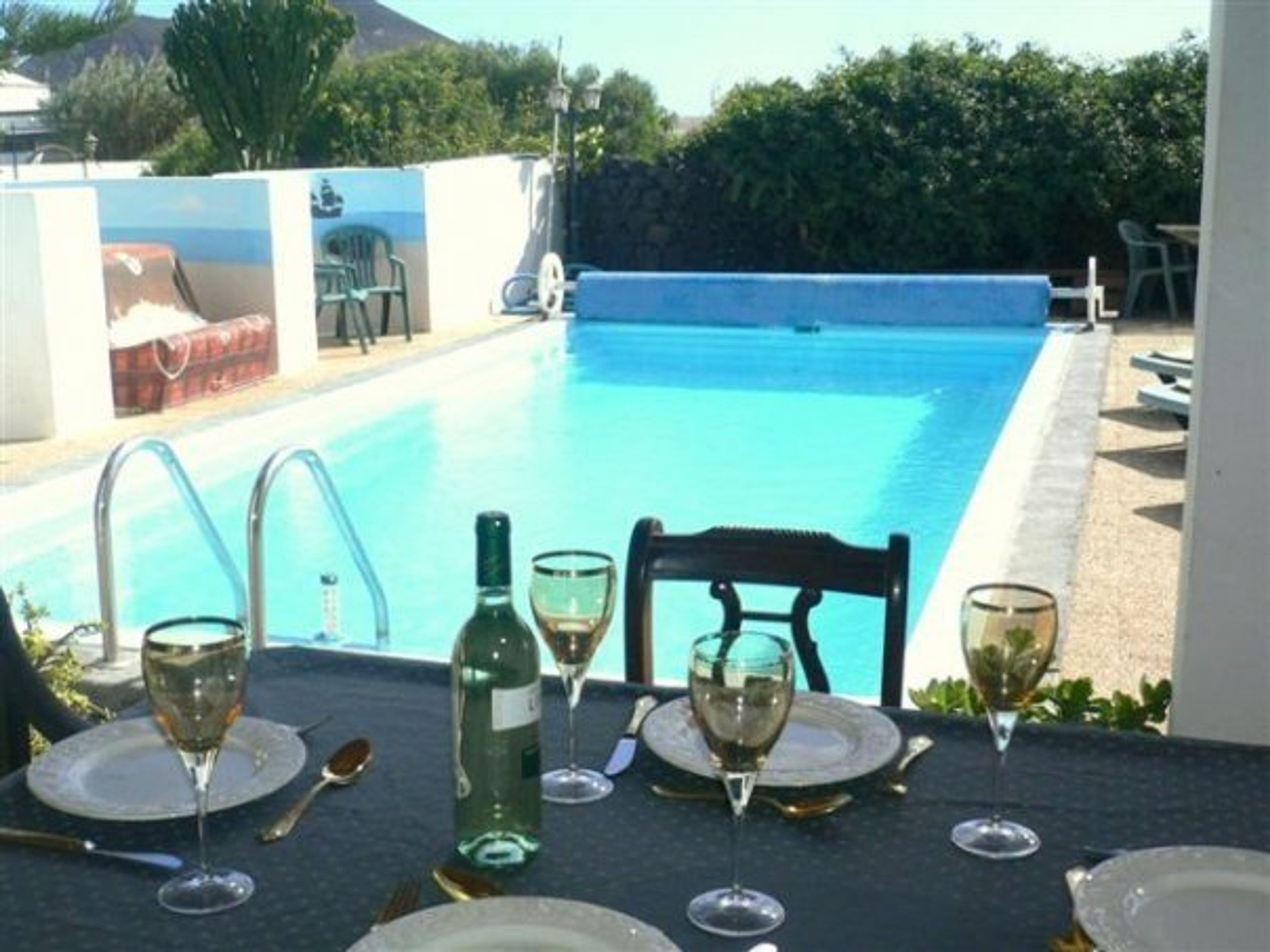 Chilled wine & Lunch, Overlooking the Pool.