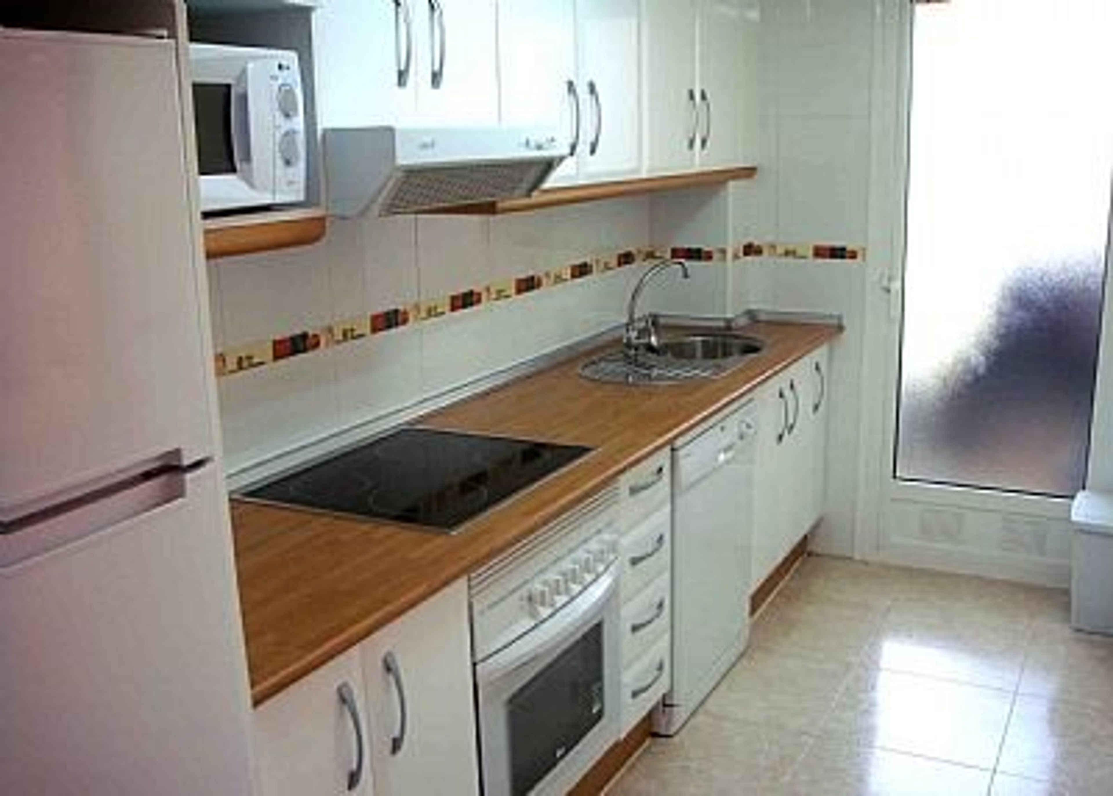 Fully Fitted Well Equipped Kitchen