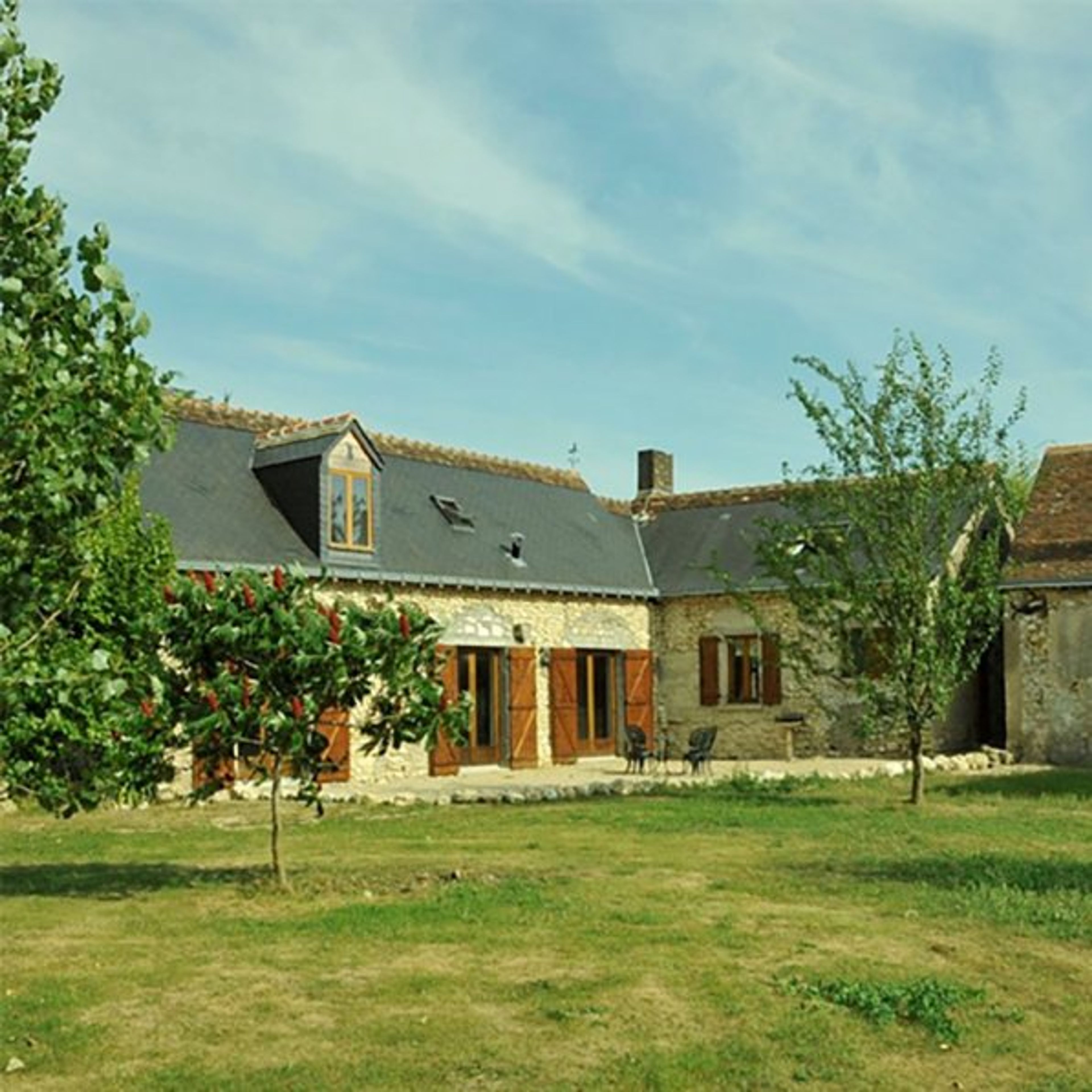 The back of the gite and sun terrace.