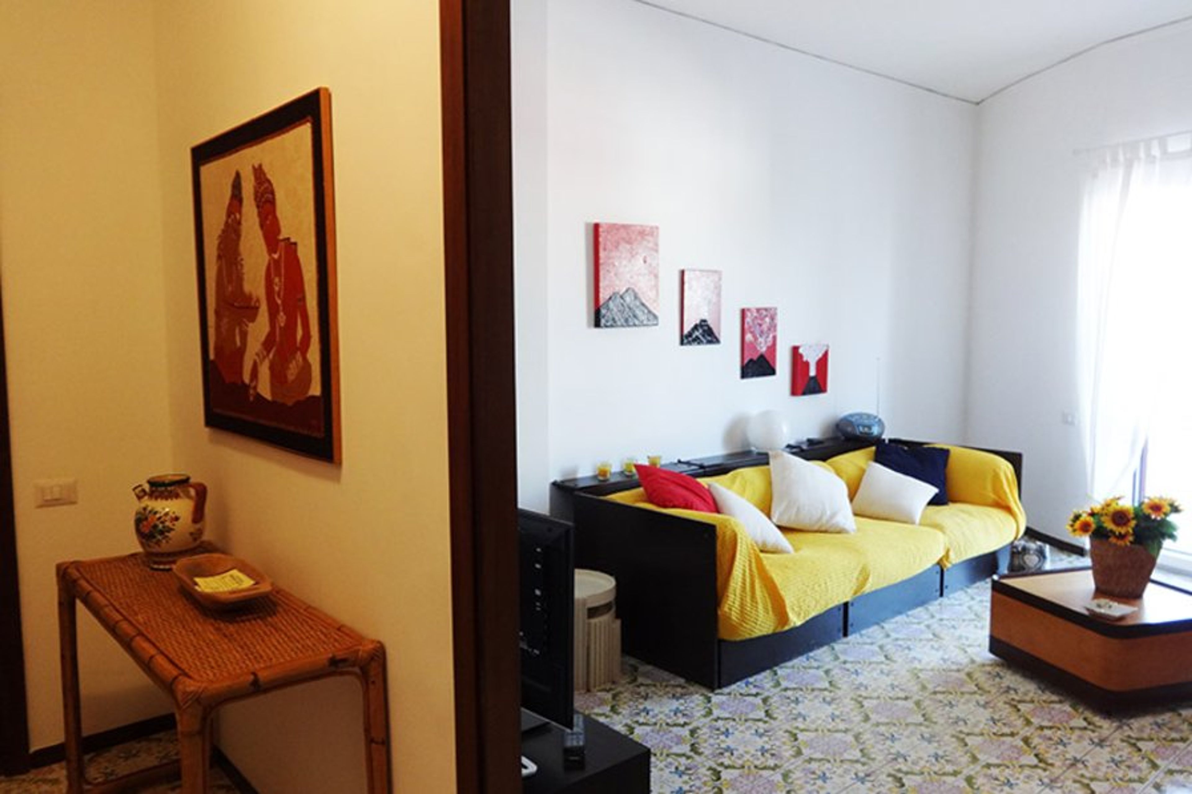 Living area with double sofa bed at casa begius sorrento holiday rents