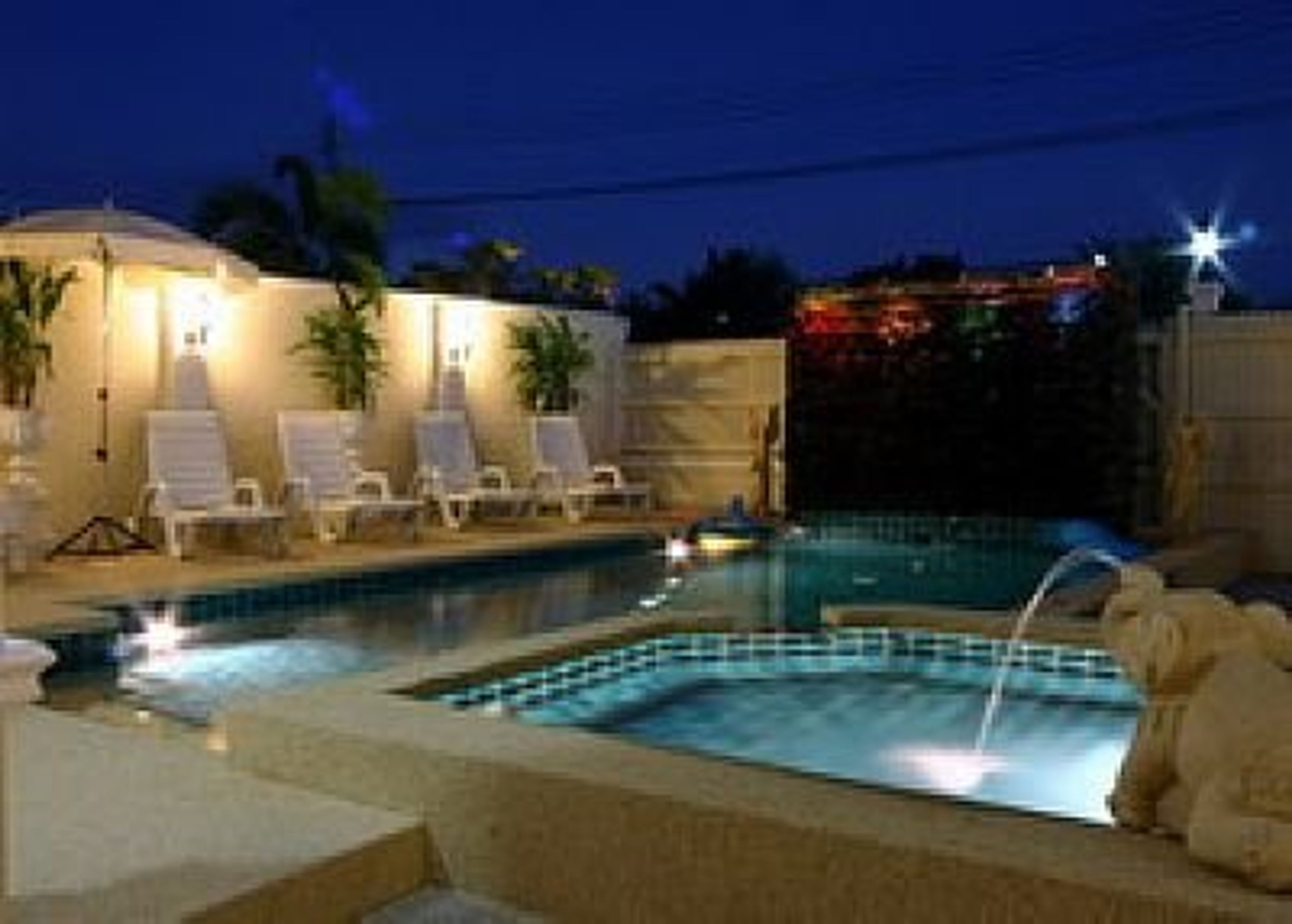 Swimming Pool At Night With Outside Lighting!