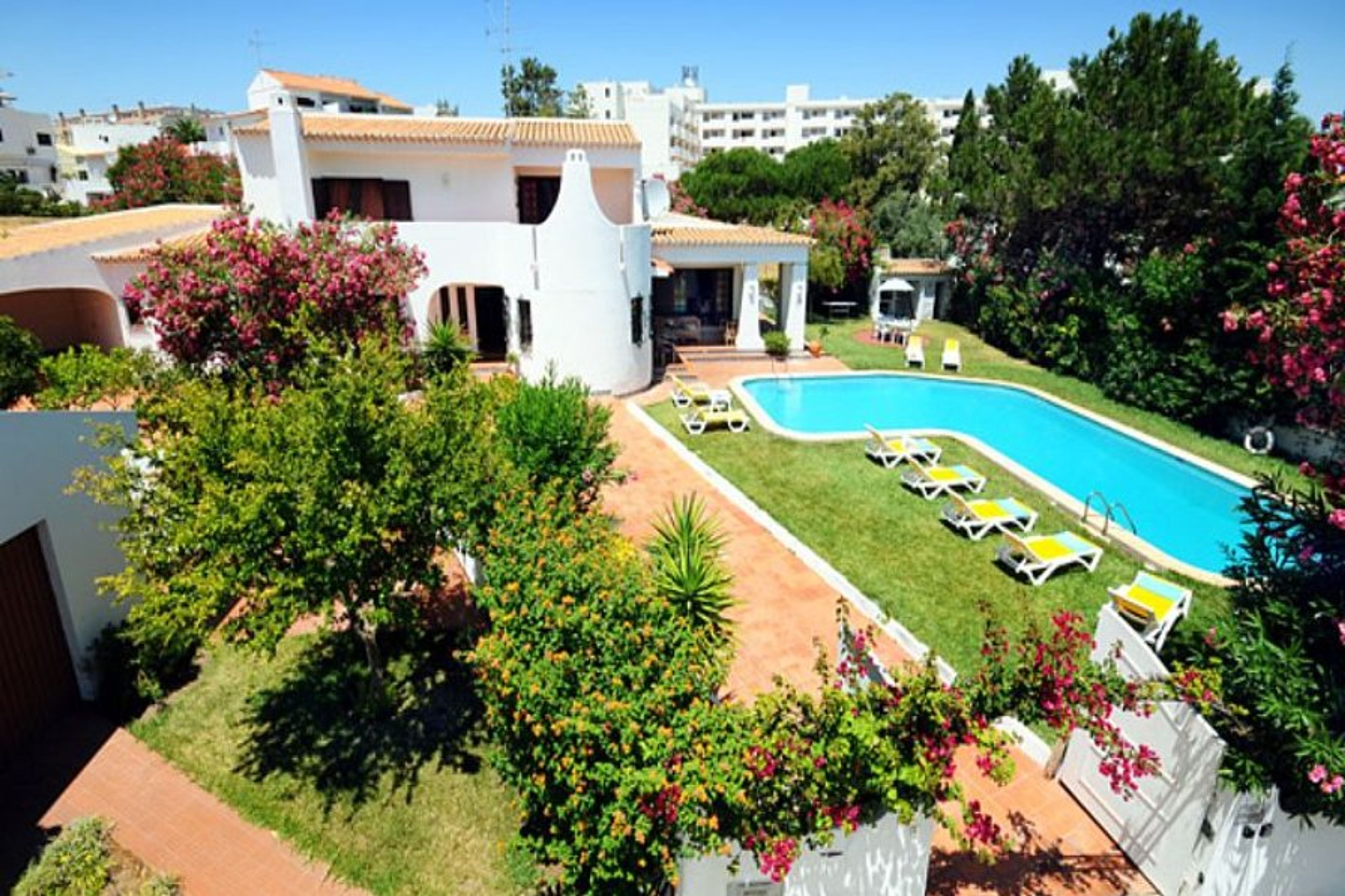 Beautiful  villa, with a large L shape private pool and garden