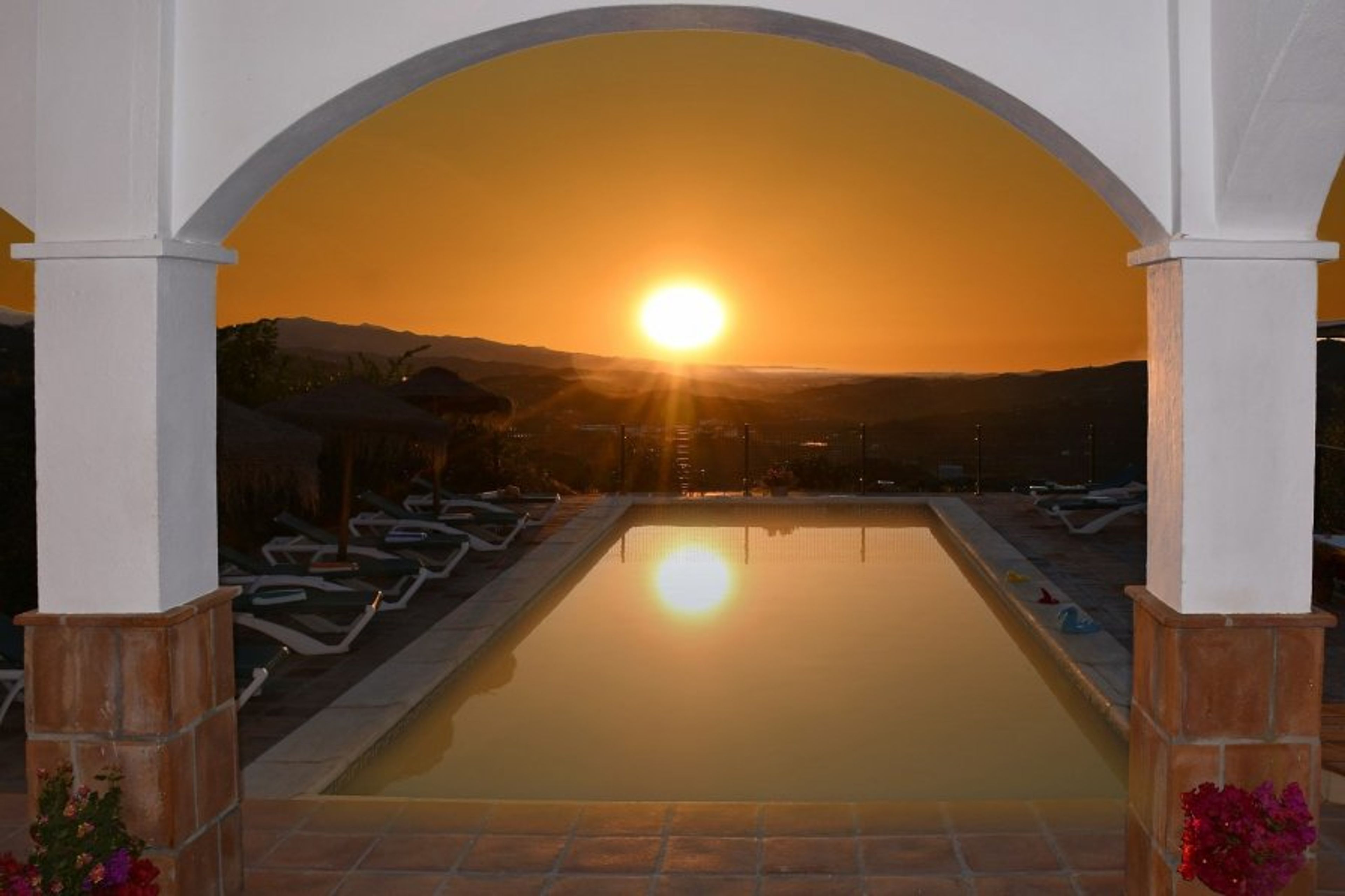 Watch the sunset, with a glass of wine. 