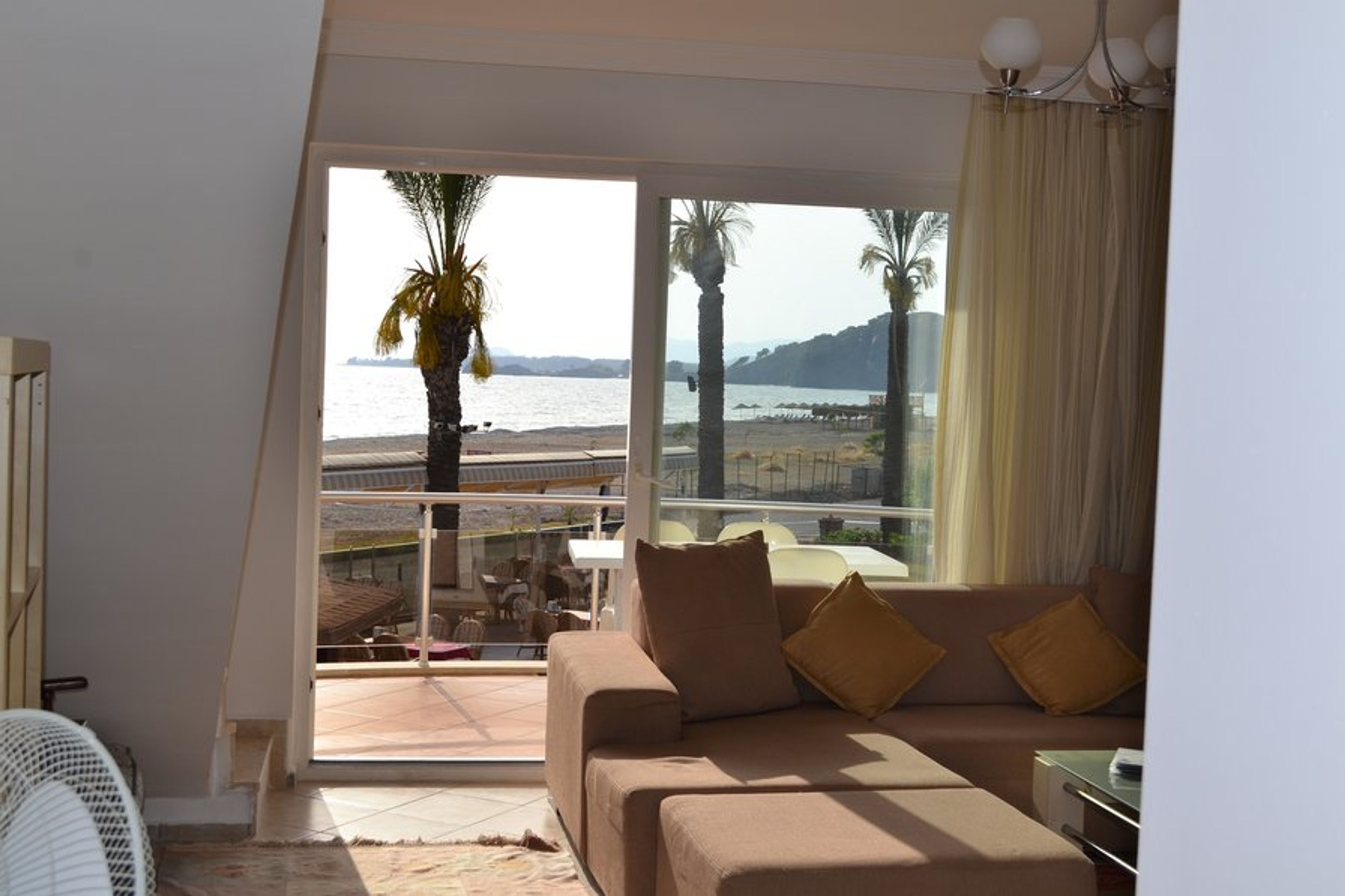 Photo from inside Poseidon 3 living area looking out to the seafront 