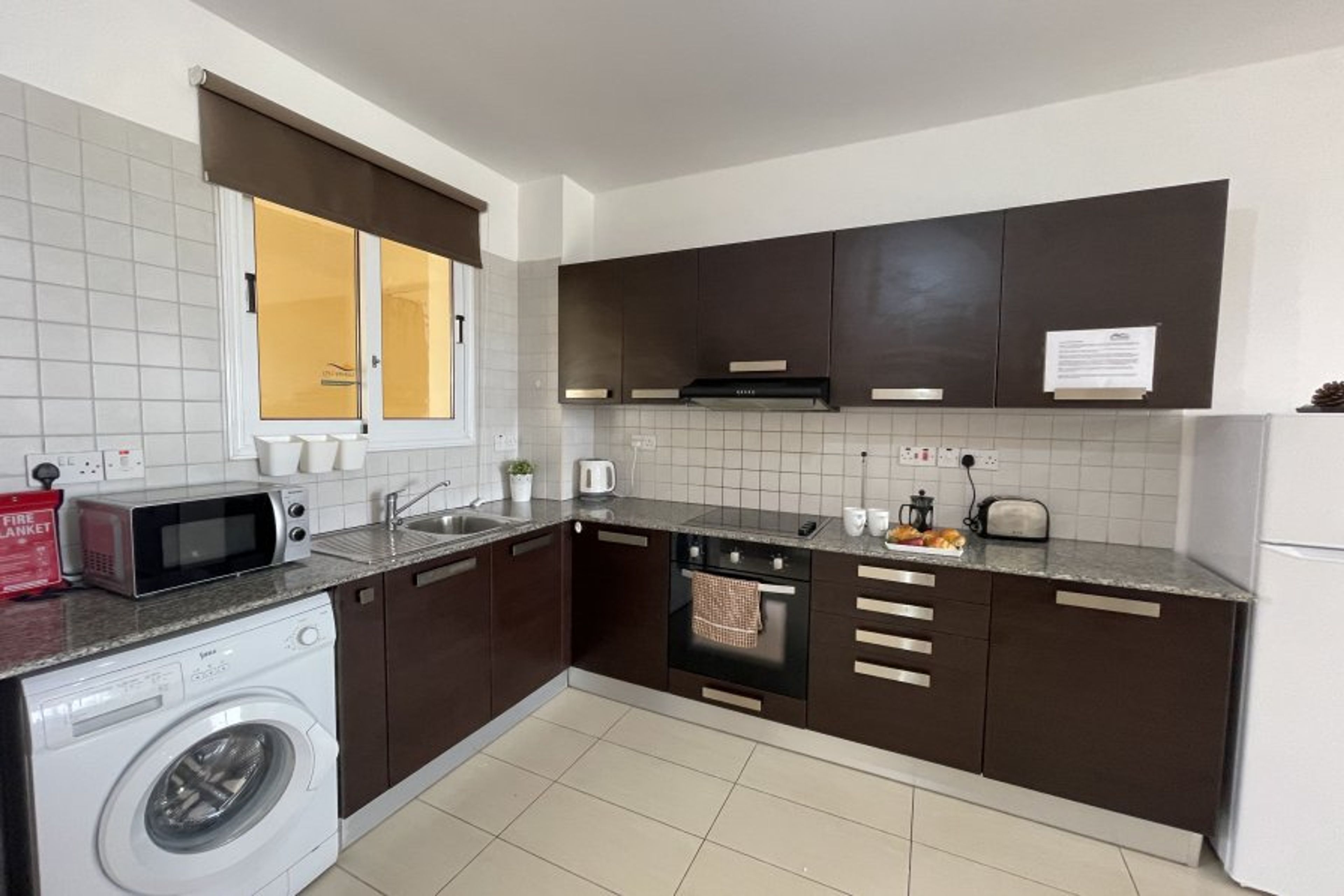 Full kitchen with machine.