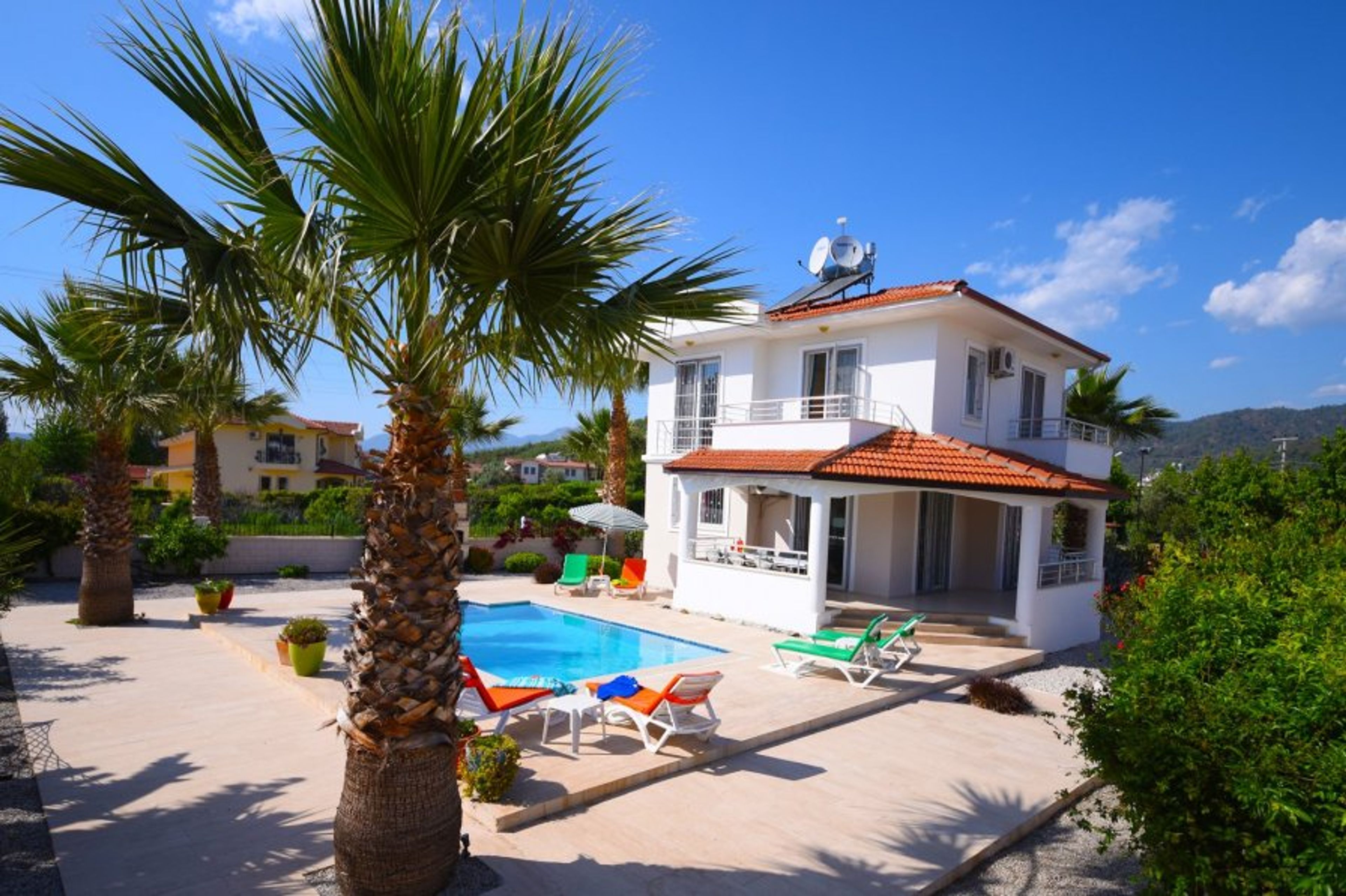 Villa and garden by day