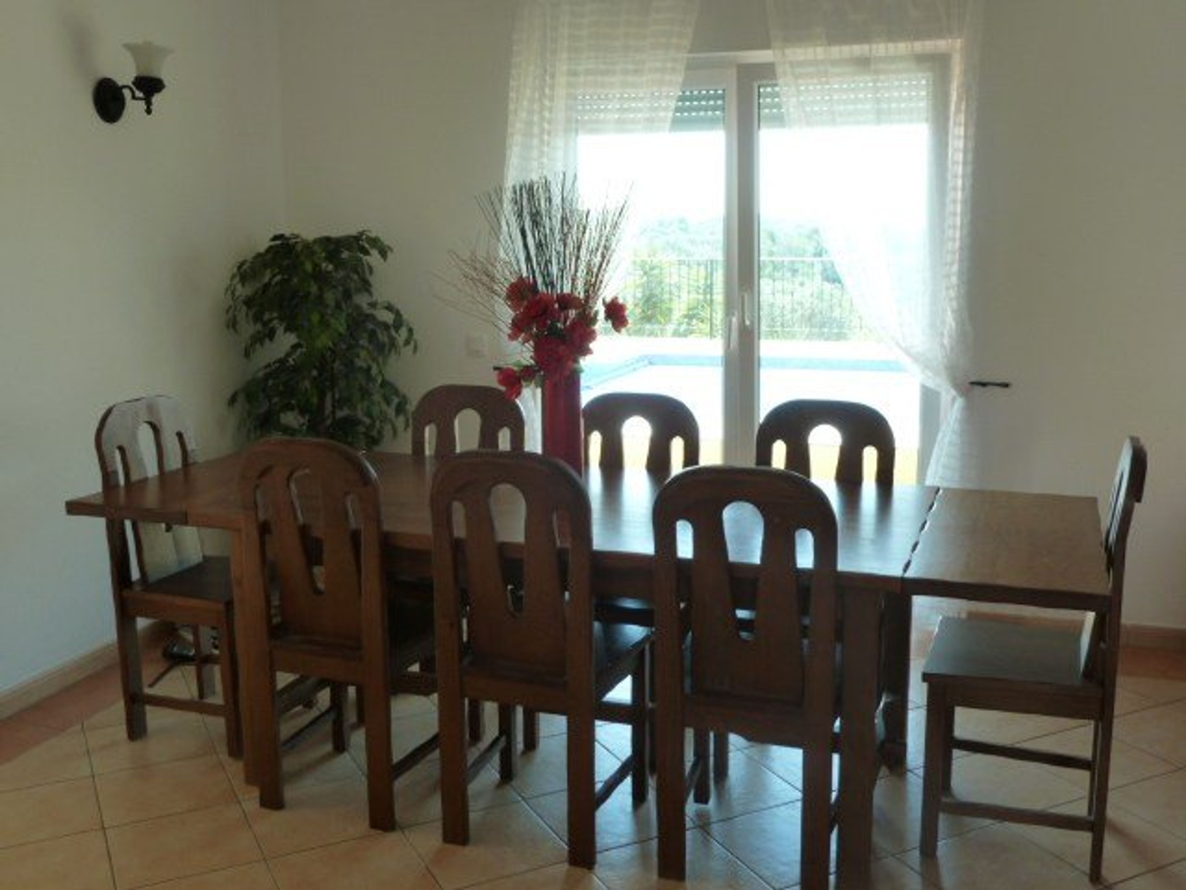 stylish dining room, seats 10 very comfortably, more chairs in villa