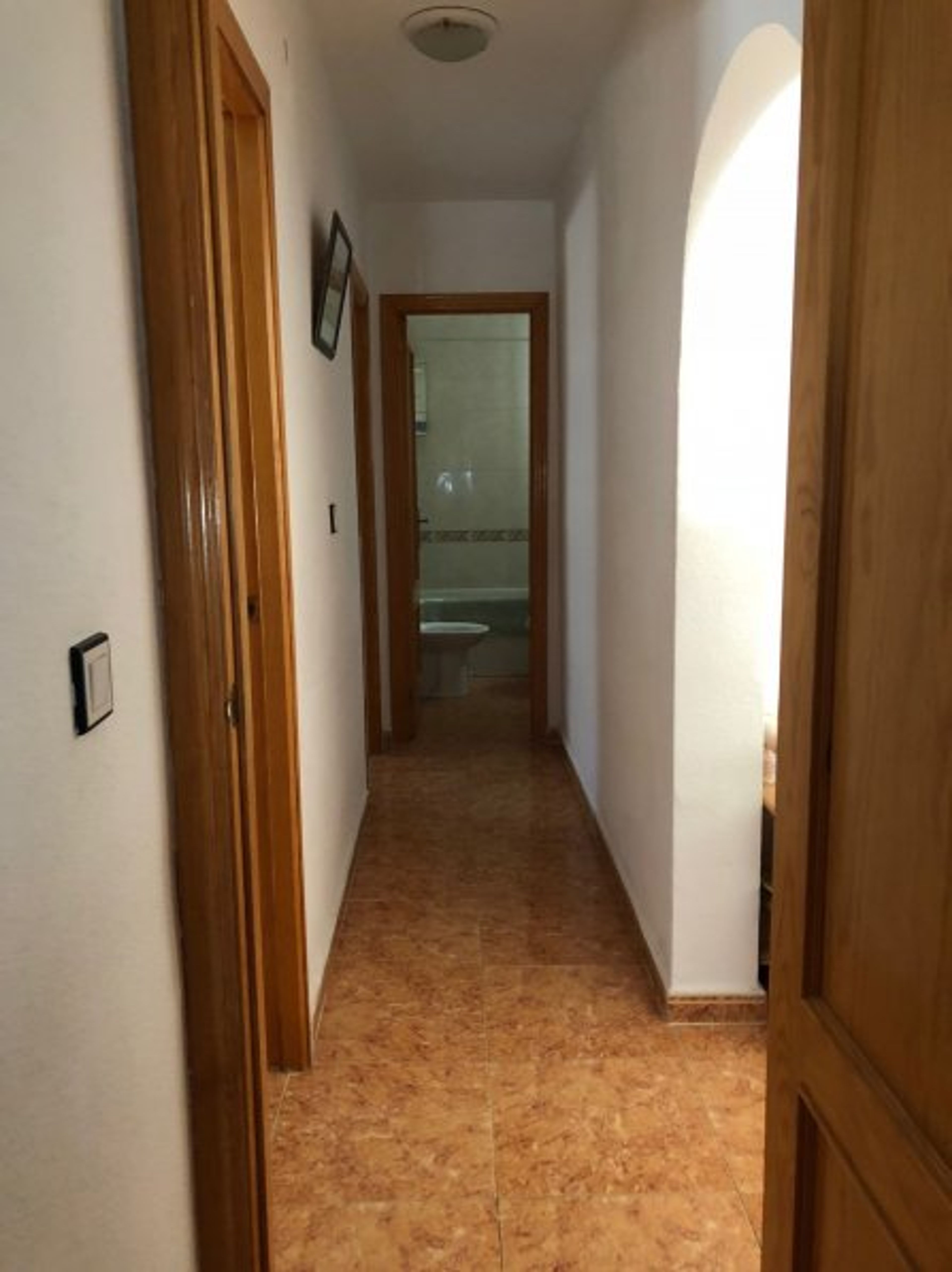 Hallway to bedrooms/bathroom