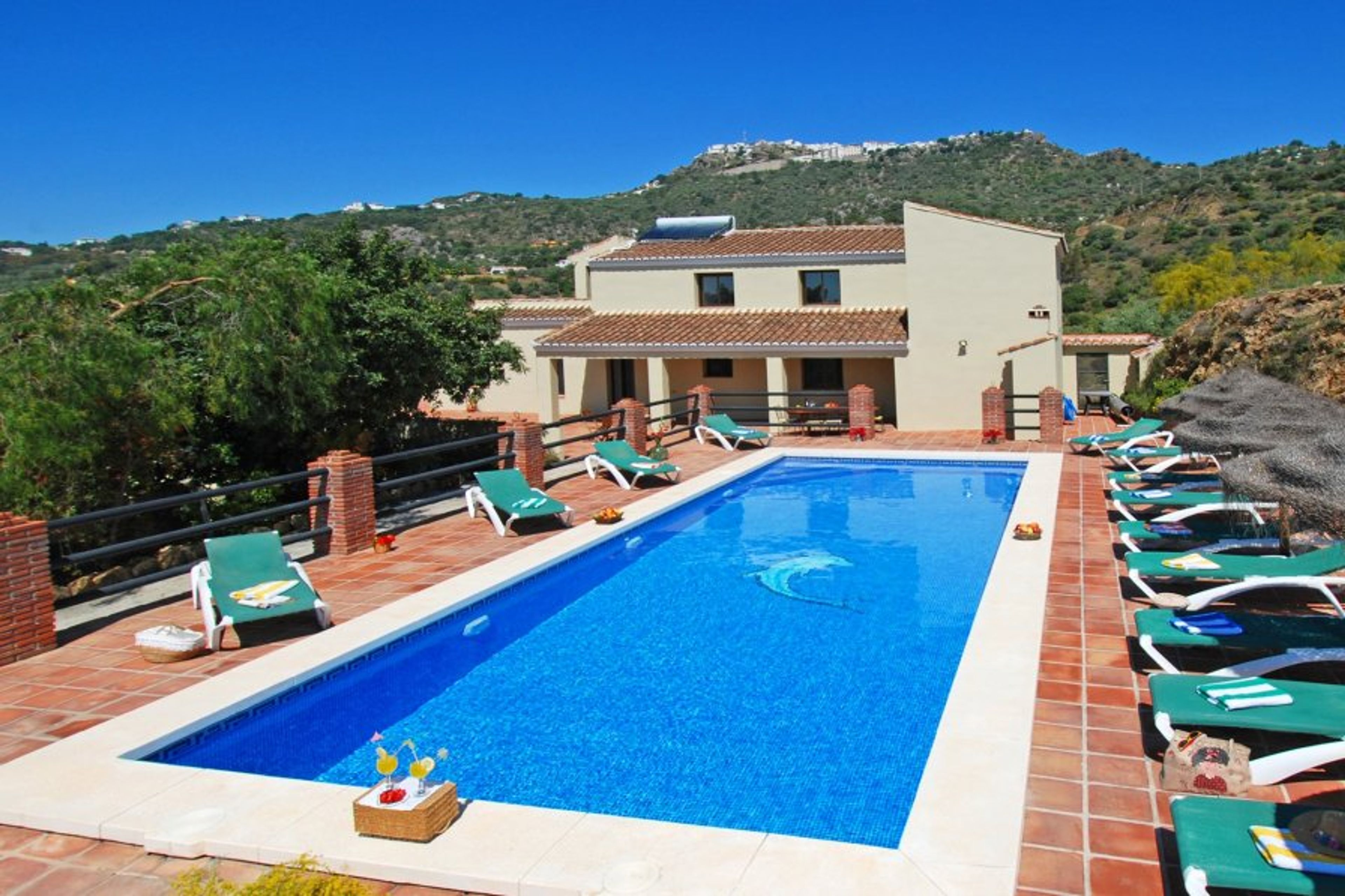 Villa, pool and terraces. 