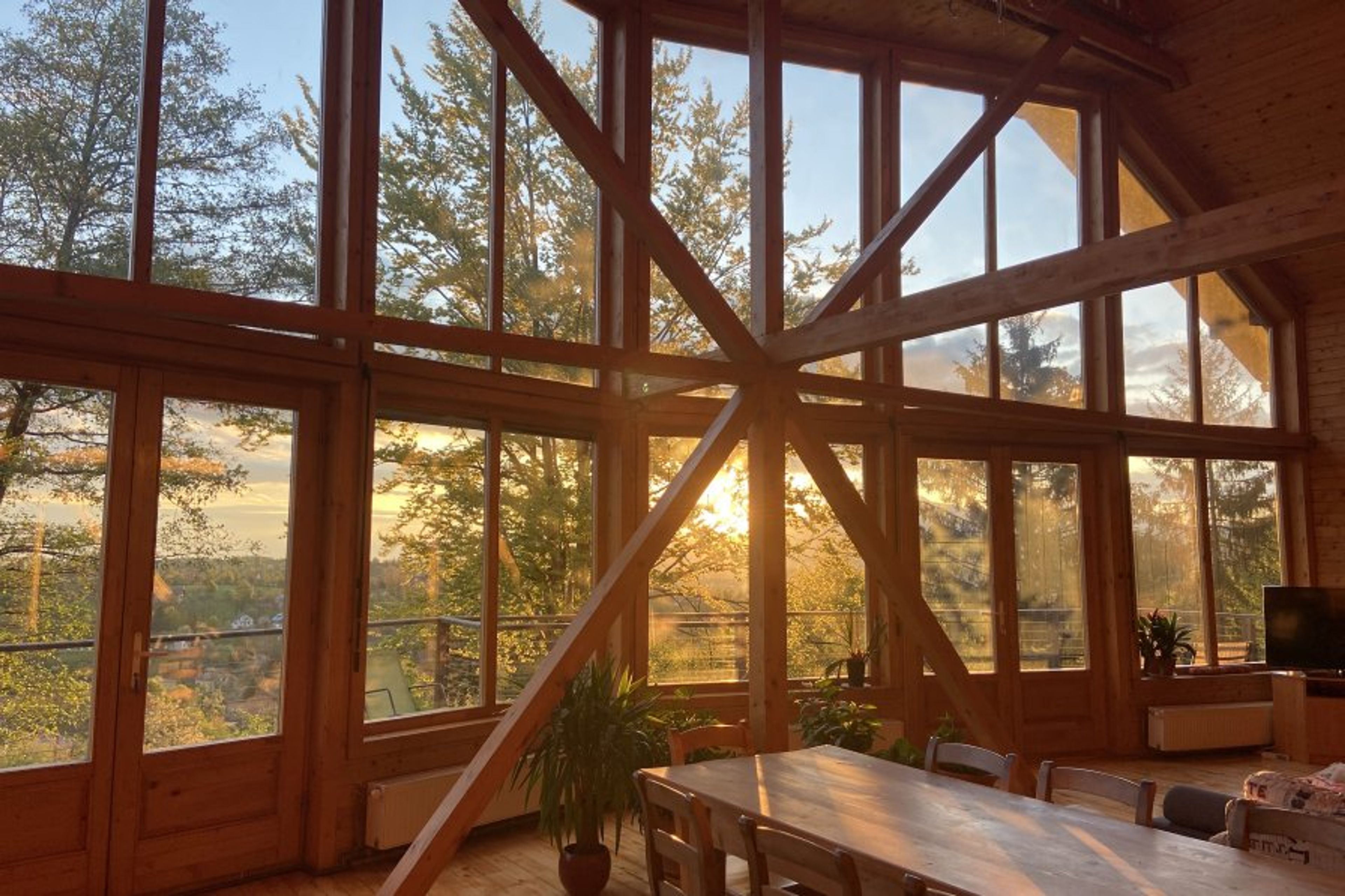 Dining table and the 8 meters high glass wall